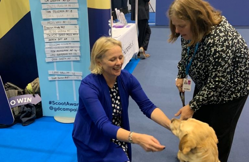 With Guide Dogs for the Blind 